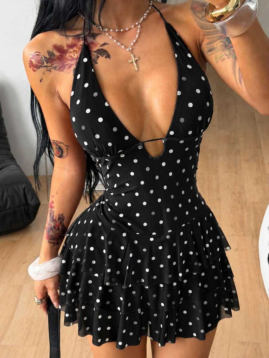 Front view of a women's lace halter mini dress featuring a slim-fit bodice, flared hem, and sleeveless design.