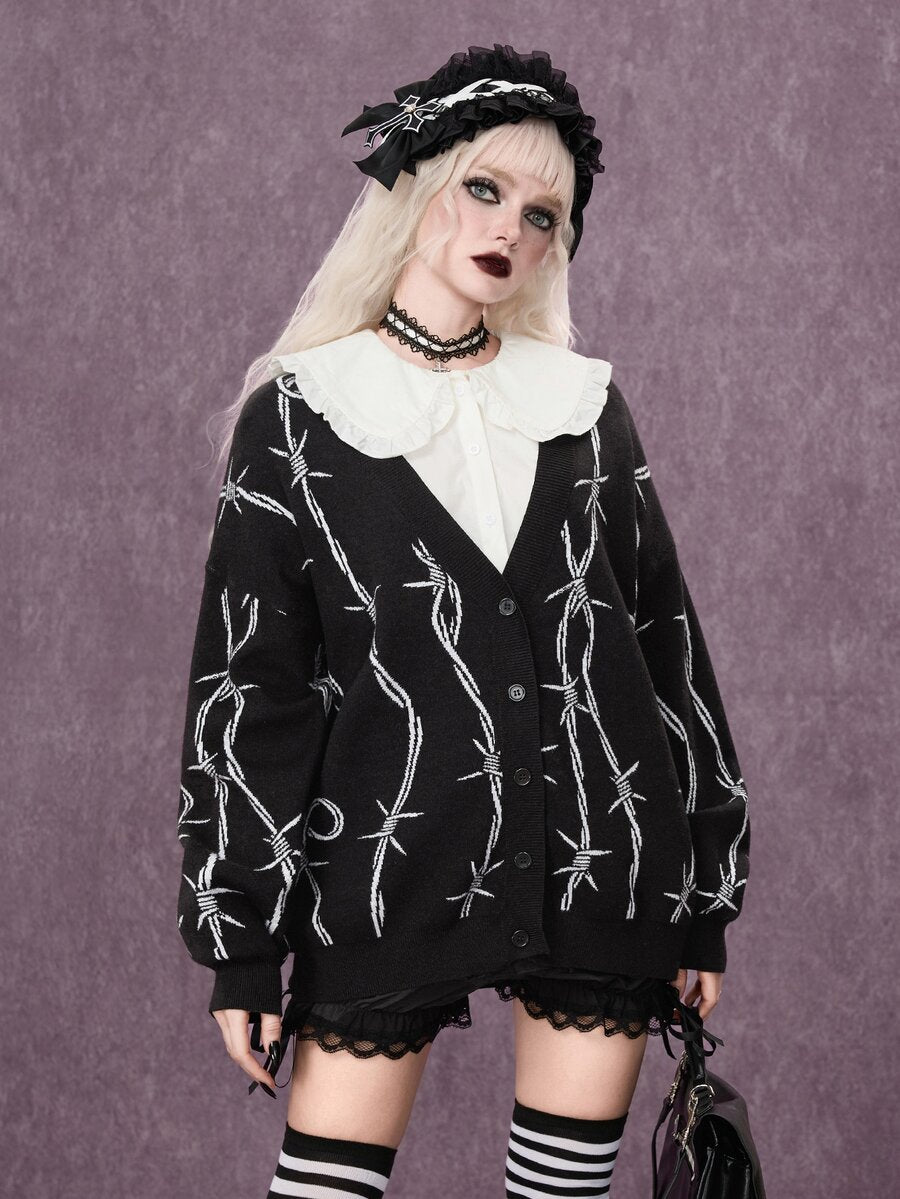 Women's oversized gothic thorn jacquard knit cardigan with V-neckline, button-front closure, and long drop-shoulder sleeves.