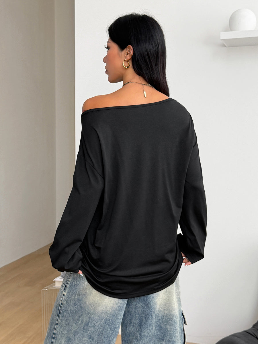 Women's brown striped boat neck long sleeve raglan T-shirt with a loose casual fit